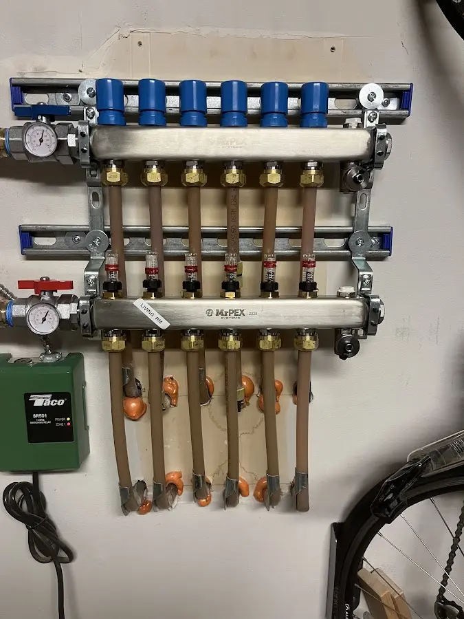 Plumber performing Water Heater Repair at a residential property in Bridgewater Town